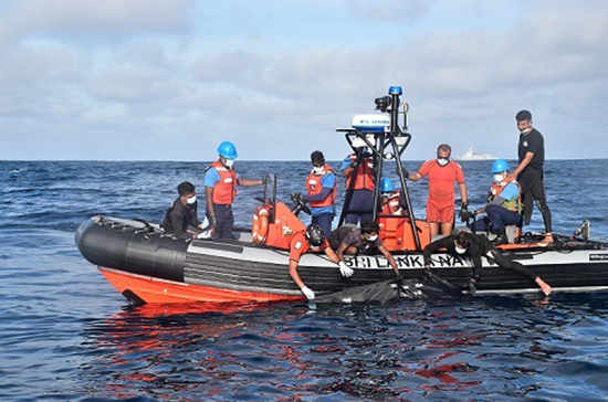 SL Navy conducts risky diving operation at overturned Chinese vessel ...